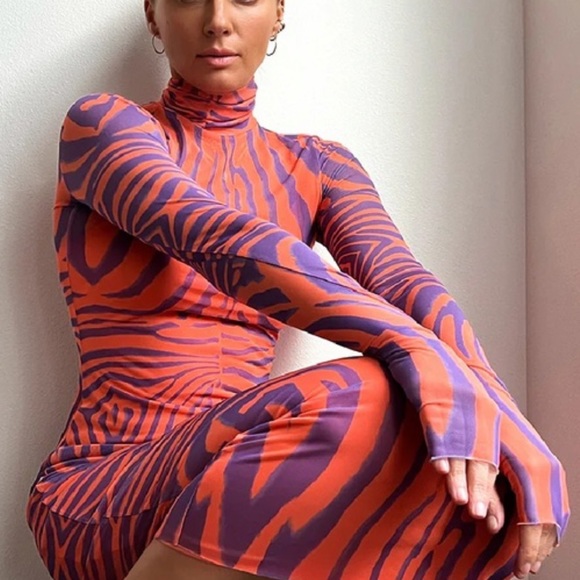 AFRM Dresses & Skirts - NWT’s AFRM tiger print Shaleine dress- Rare!